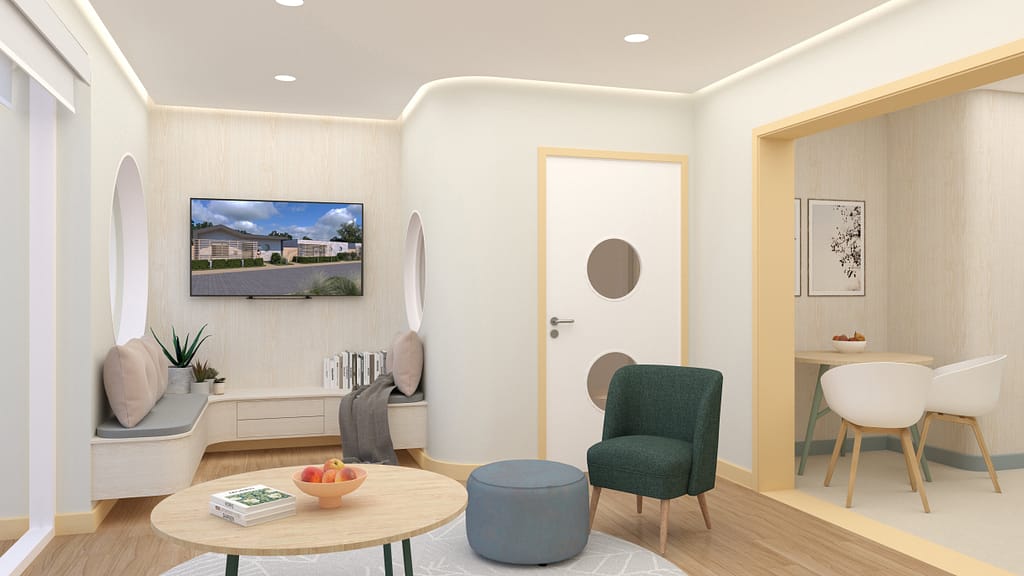 Living room and kitchen in Pax Homes modular housing prototype for neurodiverse residents