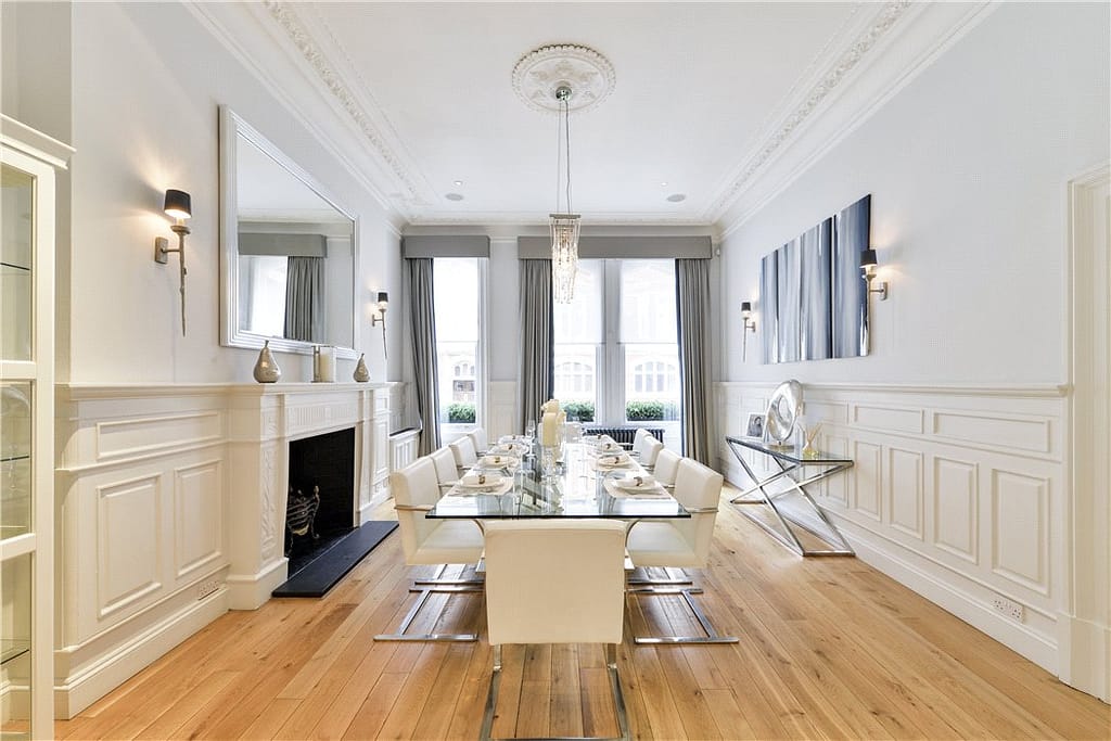 Refurbished staircase and hallway of Grade II listed property at Cadogan Gardens, Chelsea