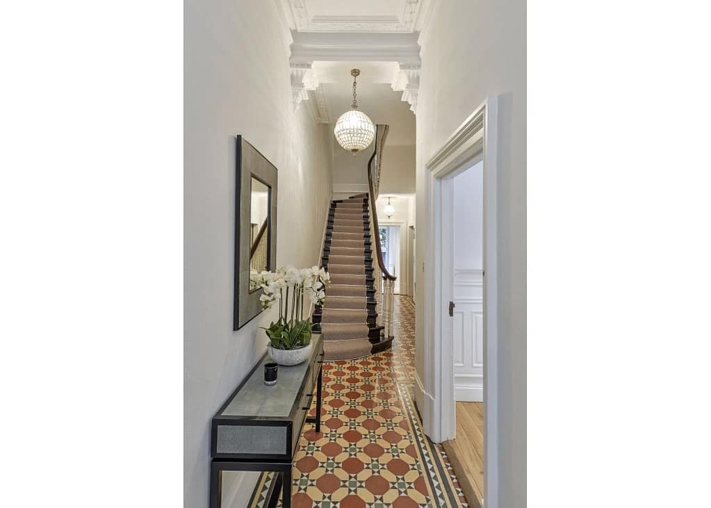 Bedroom interior of refurbished Grade II listed family home at Cadogan Gardens, Chelsea